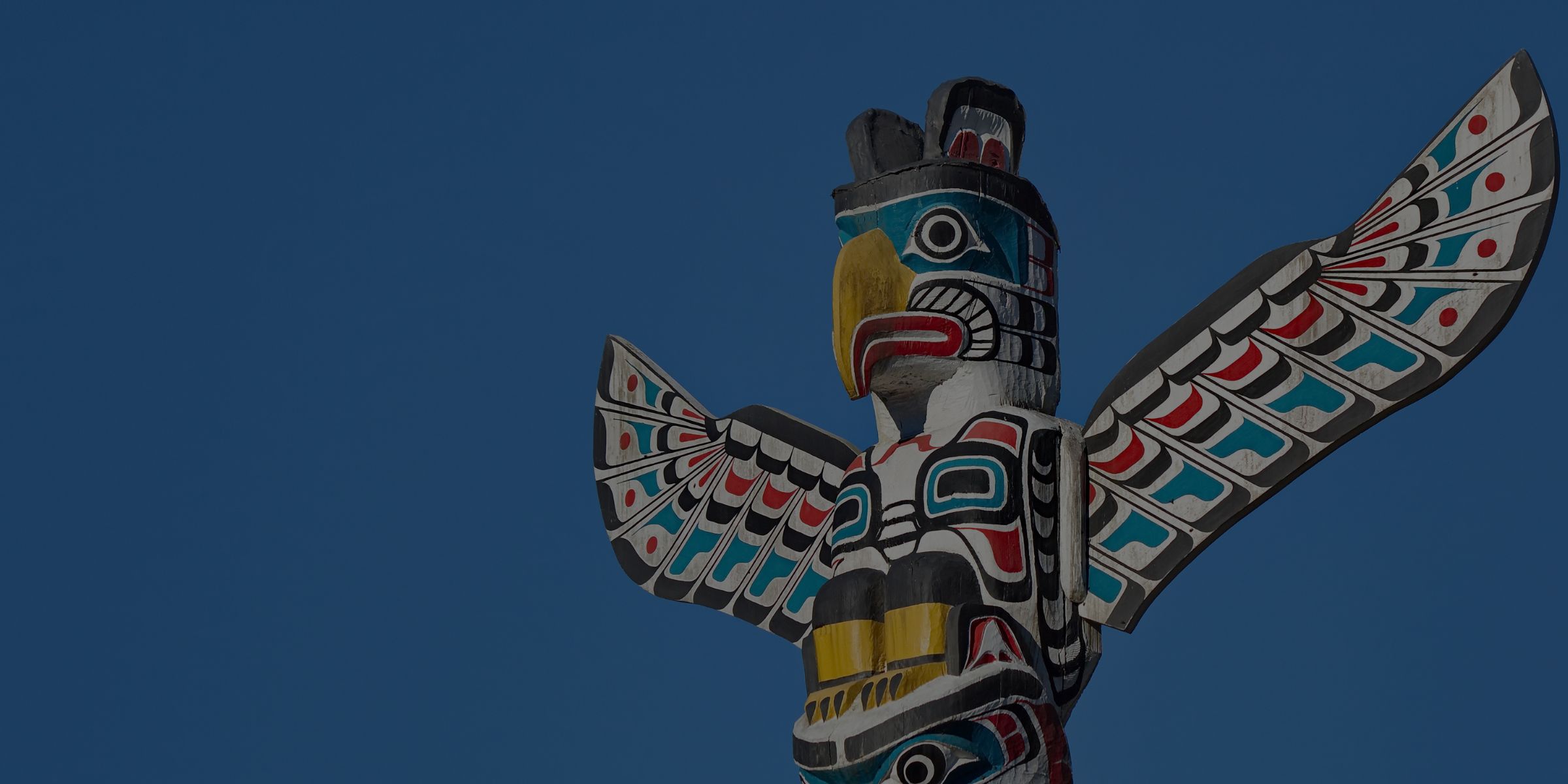Kakaso'Las totem pole located in Stanley Park, Vancouver, BC. It was carved by Ellen Neel, a Kwakwaka'wakw artist